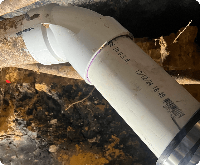 White PVC pipe with connection details.