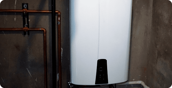 White water heater with copper pipes.
