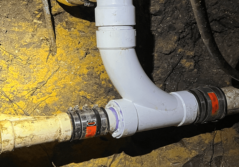 Underground PVC pipes with rubber couplings.